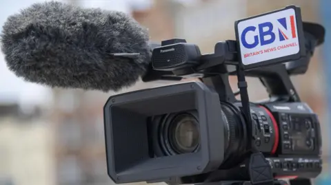 Getty Images A video camera with GB News branding