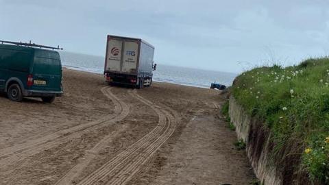 Truck on beach 