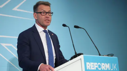Shutterstock New Reform UK Party chairman David Bull speaks at a press conference in London