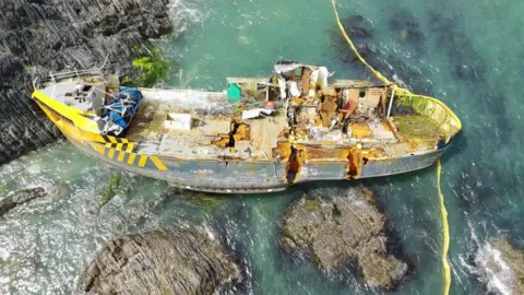 A shipwreck is seen from a bird's eye view 