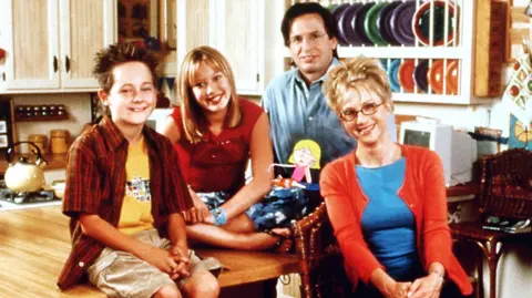 Shutterstock Jake Thomas, Hilary Duff, Robert Carradine and Hallie Todd pictured in 2001 in the Disney Channel series Lizzie McGuire