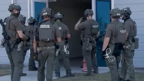 Reuters Immigration agents entering the Hyundai battery plant