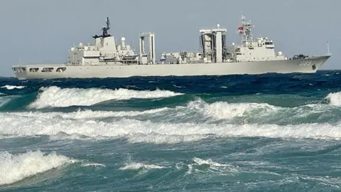 A warship is seen in the waters during a joint naval exercise dubbed 'Peace Resolve'.