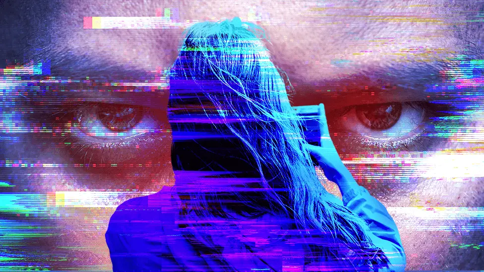 BBC Woman holding phone - eyes of man in background