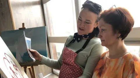 Maria Ivashchenko Maria painting with a Ukrainian woman