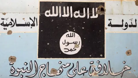 Getty Images A sign belonging to IS near Hawija.