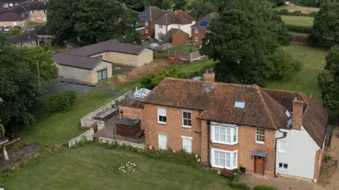 PA Media Captain Tom Moore home spa building