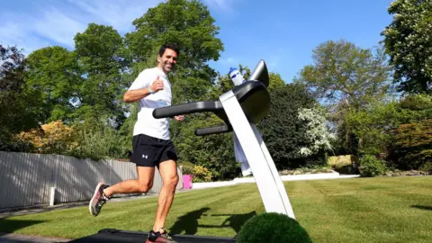 Matt Watson/Getty Images Benali in back garden