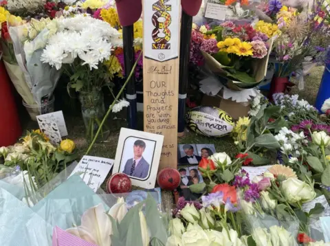 PA Media Flowers and tributes to Barnaby
