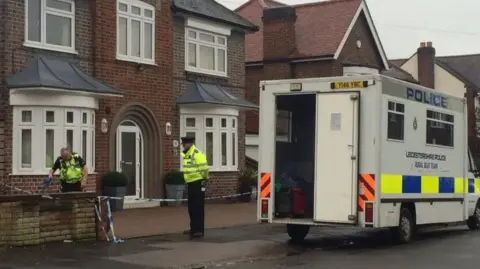 A police cordon outside a house in Holmfield Avenue in Leicester.