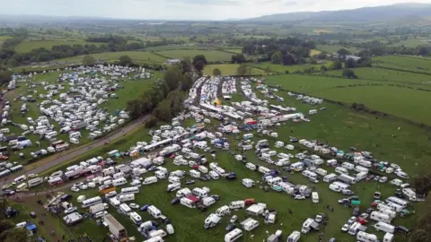 PA Media The travellers site at the Appleby Horse Fair