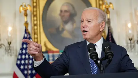 Reuters Joe Biden gestures as he speaks at the White House on February 8