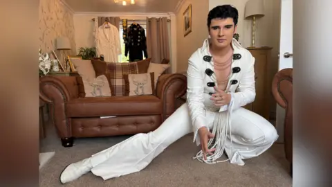 BBC Lewis Goddard dressed as Elvis