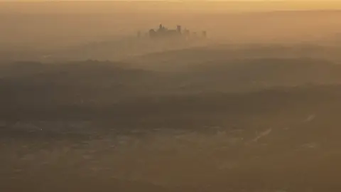 Mario Tama A view of smog over Santiago, Chile on 9 July 2018