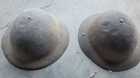 WW2 helmets find linked to SS massacre of Royal Norfolk soldiers