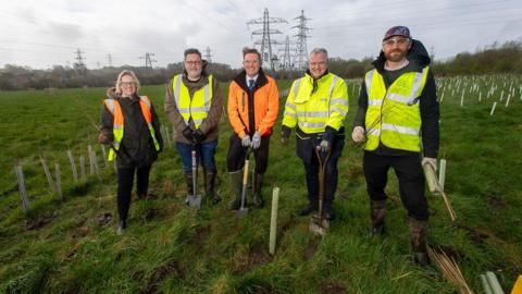 Electricity North West and Raise Cumbria representatives at the site