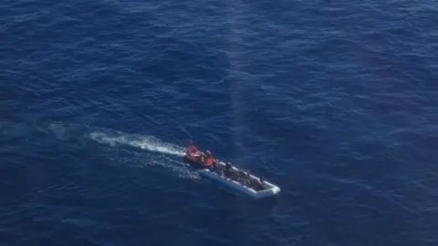 Robin Jenkins / Twitter Aerial photo of a boat in the sea