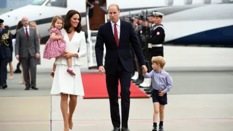 EPA The family arrive in Warsaw