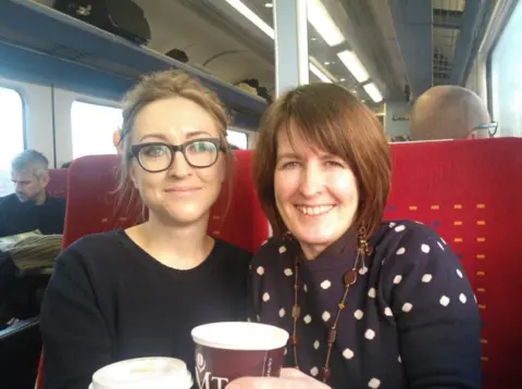 Supplied Louise Wright sat on a train with her mum Sharon Brown