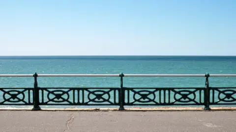 Getty Images The image shows a set of railings, and the sea behind it.