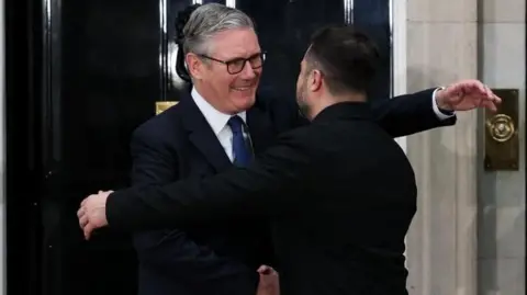 Sir Keir Starmer and Volodymyr Zelenskyy sharing a hug outside of 10 Downing Street on Sunday