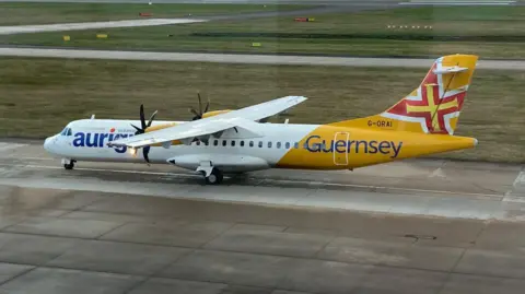 BBC An Aurigny plane - ATR 72-600 G-ORAI - taxing as it heads onto the runway.
