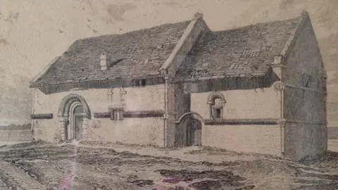 Cambridge Past, Present & Future A line drawing of the Cambridge Leper Chapel in 1818 showing tiles falling off the roof, a chimney and rough ground in front