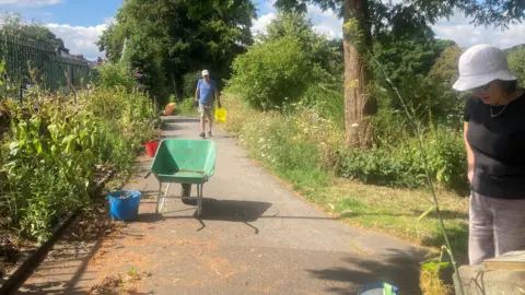 Volunteers in park