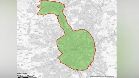 Bradford Council A map of the Bradford area with a highlighted zone indicating the Clean Air Zone (CAZ) boundary. The base map is in grayscale and displays roads, neighbourhoods, and surrounding areas in fine detail, while the CAZ area is filled with a semi-transparent green colour and outlined with a bold red border.