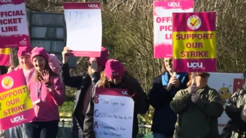 Employees from four colleges across Berkshire and Surrey joined forces on the picket line as they take strike action over pay.