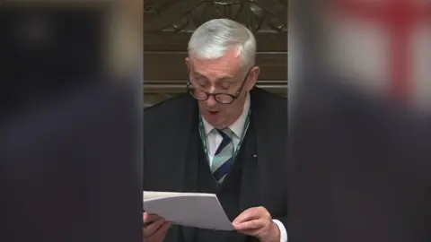 Sir Lindsay Hoyle reading of a piece of paper