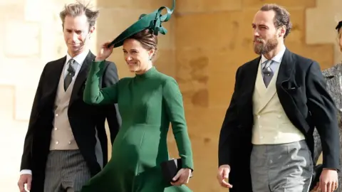 AFP/Getty Images Pippa Middleton with her husband James Matthews (left) and brother James Middleton (right)