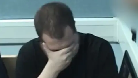 Counter Terrorism Policing South East Lewis Ludlow listening to the recording of himself declaring allegiance to IS