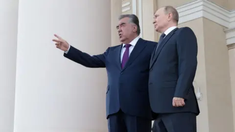 ALEXANDER SHCHERBAK/KREMLIN POOL/SPUTNIK/EPA-EFE Russian President Vladimir Putin (R) listens to Tajikistan's President Emomali Rahmon (L) during their meeting in Dushanbe, Tajikistan, 28 June 2022