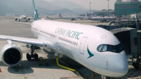 Getty Images Cathay Pacific plane at Hong Kong airport.