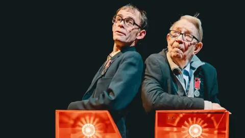Andrew Billington Baldwin (right) with actor Michael Hugo, who plays the "Real Neil" in the Marvellous stage show