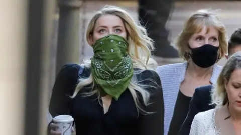 AFP Amber Heard arrives at the High Court on Friday