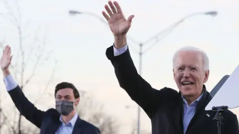 Getty Images Joe Biden with Jon Ossoff in Center Parc Stadium, Atlanta, Georgia, on 4 January 2020