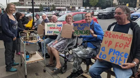 A Place to Sit Sit-in at Bramley Shopping Centre