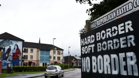 Reuters A sign near the Irish border that reads: 'Hard border, soft border, no border'