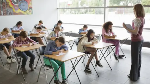 Getty Images Teacher in a classroom