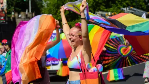 Mark Lewis A woman enjoying Cardiff Pride 2022