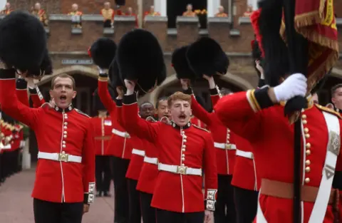 Tolga Ovali/Anadolu Agency via Getty Images The Band of the Coldstream Guards saluted the the proclamation.