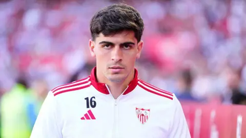 Juanlu Sanchez looking towards the camera