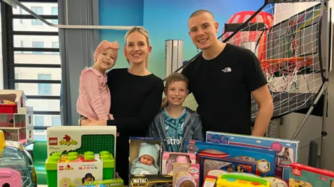 UHNM Charity Freddie, Mabel and mum and dad at Royal Stoke