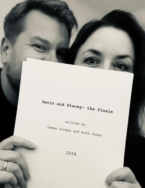 PA/James Corden James Corden and Ruth Jones holding Gavin and Stacey finale script