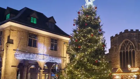 Peterborough City Council Christmas tree with decorations in front of the guildhall