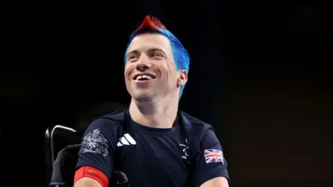 David Smith smiles