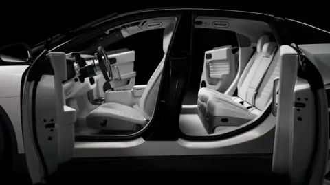 RM Sotheby's An interior view of the Luce, with its all-white leather seats
