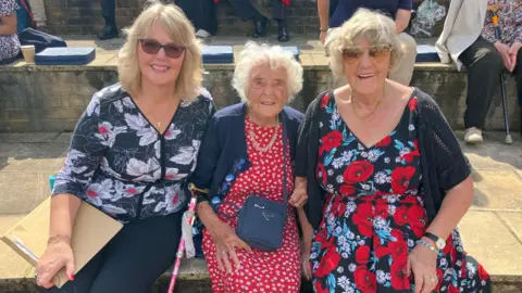 BBC/Leanne Rinne Kay Carey with her daughter and granddaughter